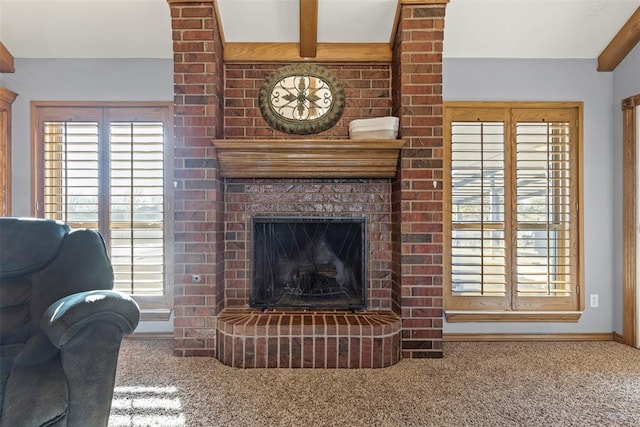 carpeted living area featuring a fireplace and baseboards