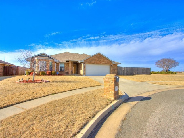 ranch-style home featuring a garage, driveway, fence, and brick siding