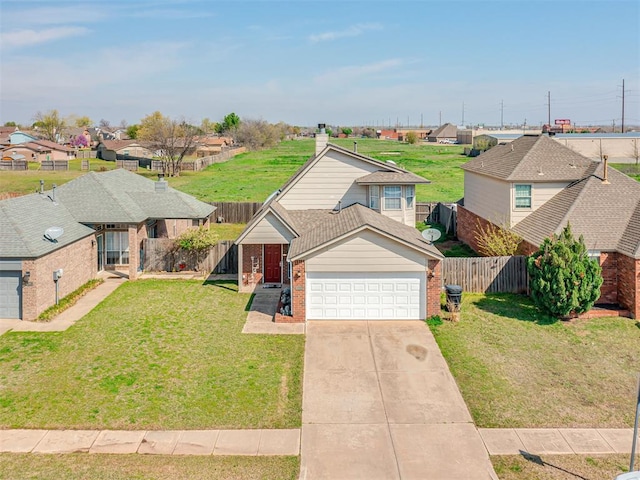 traditional home with concrete driveway, a residential view, fence, a front lawn, and brick siding