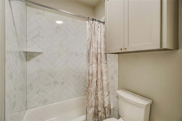 bathroom featuring toilet and shower / bath combo with shower curtain