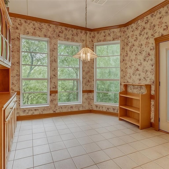 16632 Parkhurst Rd, Edmond, OK 73012 - unfurnished dining area featuring wallpapered walls, plenty of natural light, light tile patterned flooring, and ornamental molding