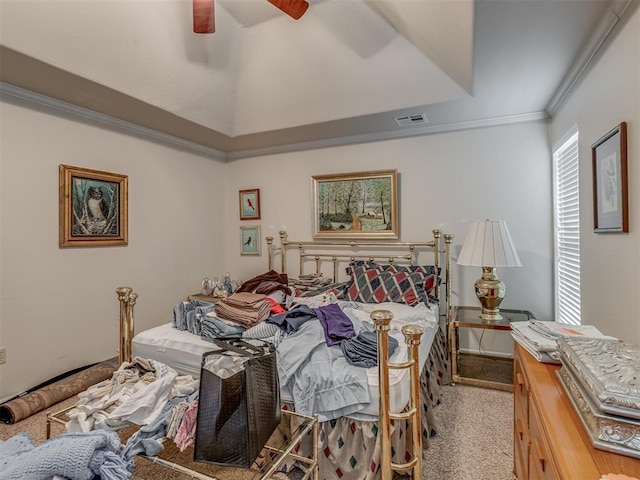16632 Parkhurst Rd, Edmond, OK 73012 - carpeted bedroom with ceiling fan, ornamental molding, and a tray ceiling