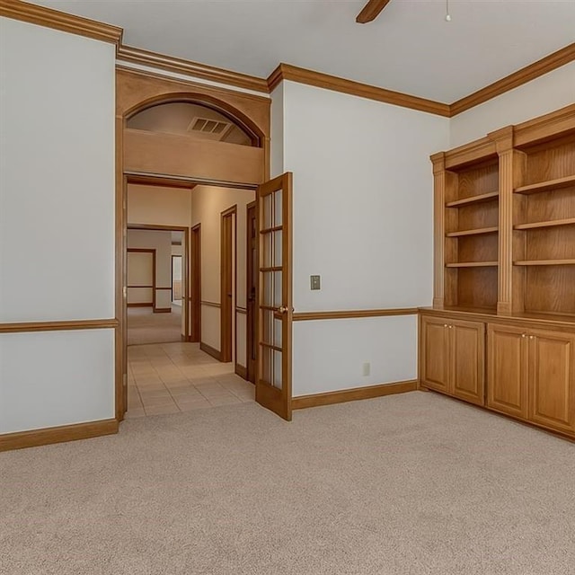 16632 Parkhurst Rd, Edmond, OK 73012 - empty room with light colored carpet, crown molding, and ceiling fan