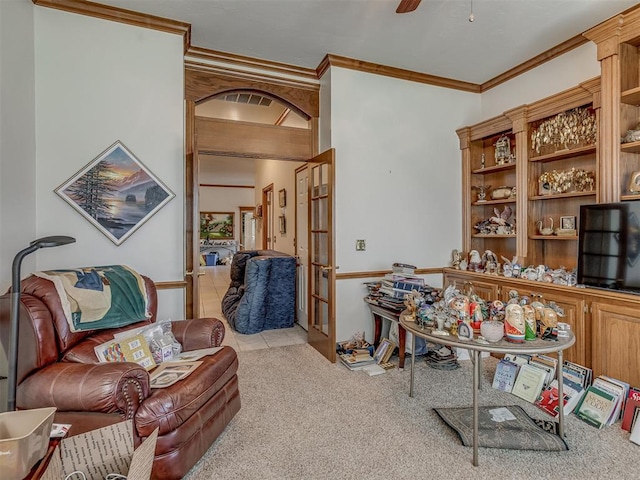 16632 Parkhurst Rd, Edmond, OK 73012 - living room with ornamental molding, carpet floors, a ceiling fan, and french doors