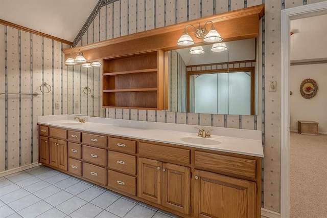16632 Parkhurst Rd, Edmond, OK 73012 - full bath with wallpapered walls, double vanity, lofted ceiling, and tile patterned floors