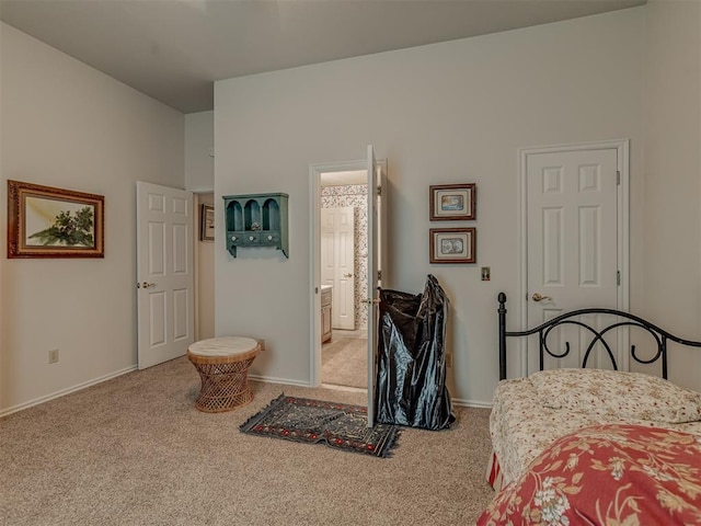 16632 Parkhurst Rd, Edmond, OK 73012 - bedroom with light colored carpet and connected bathroom