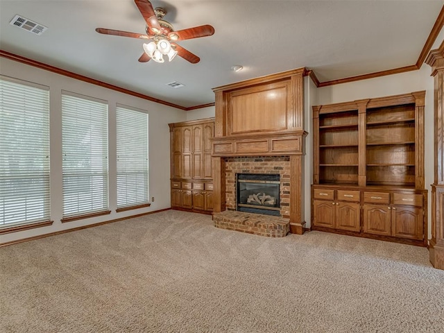 16632 Parkhurst Rd, Edmond, OK 73012 - unfurnished living room with a ceiling fan, light colored carpet, a brick fireplace, and ornamental molding