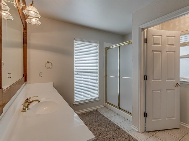 16632 Parkhurst Rd, Edmond, OK 73012 - bathroom with a shower stall, vanity, and tile patterned flooring