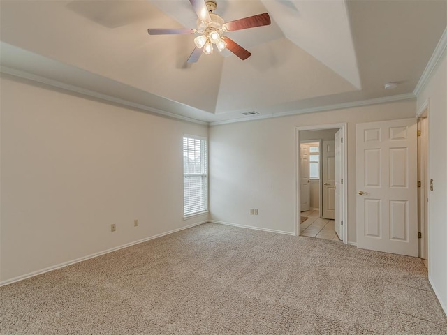 16632 Parkhurst Rd, Edmond, OK 73012 - unfurnished room featuring light carpet, a ceiling fan, ornamental molding, a smoke detector, and a raised ceiling