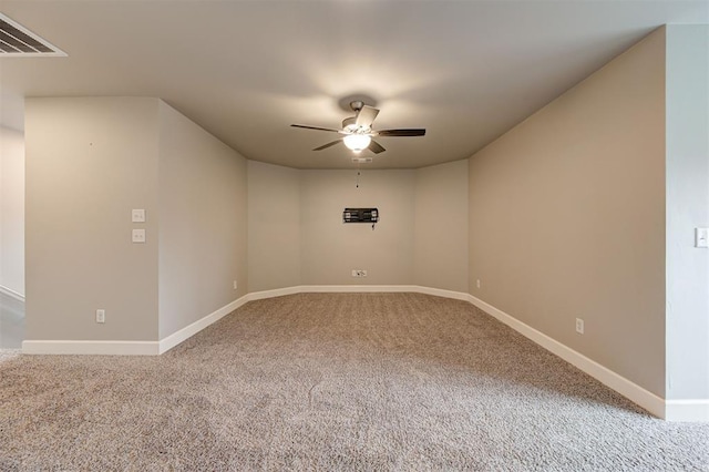 12709 Pinewood Ln, Oklahoma City, OK 73142 - carpeted empty room with visible vents, a ceiling fan, and baseboards