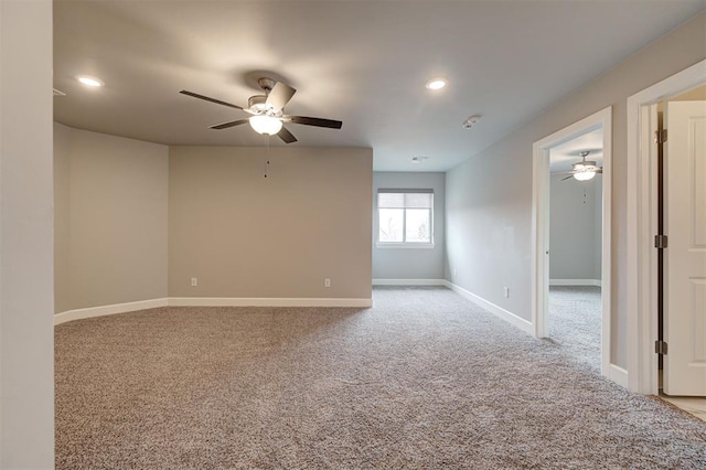 12709 Pinewood Ln, Oklahoma City, OK 73142 - carpeted spare room with a ceiling fan, baseboards, and recessed lighting