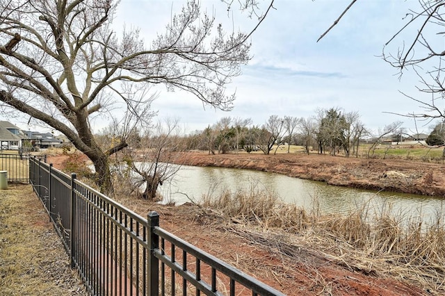 12709 Pinewood Ln, Oklahoma City, OK 73142 - view of water feature with fence