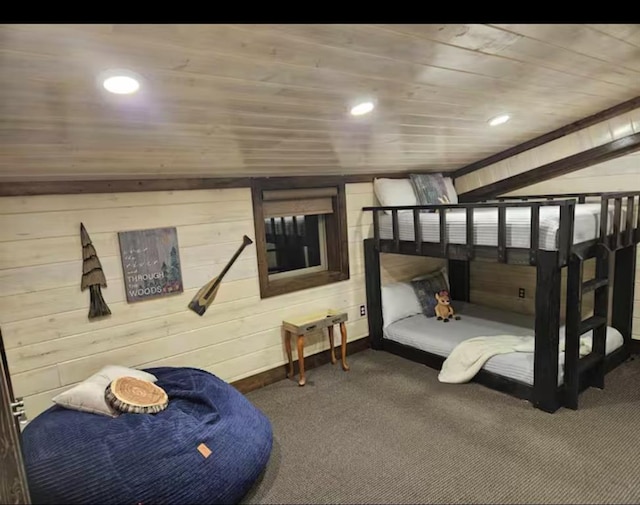 bedroom featuring recessed lighting, carpet, wood ceiling, and wooden walls