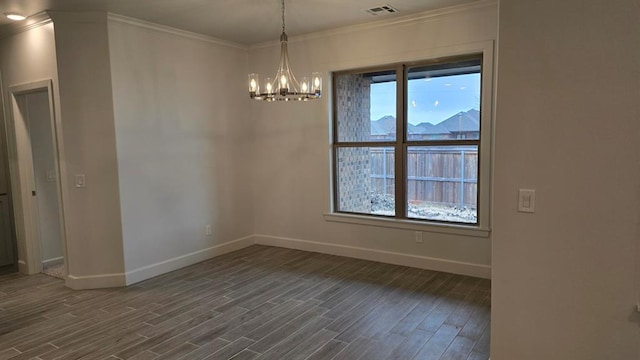 empty room with baseboards, crown molding, visible vents, and dark wood-type flooring