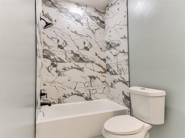 full bathroom featuring toilet and shower / bathing tub combination