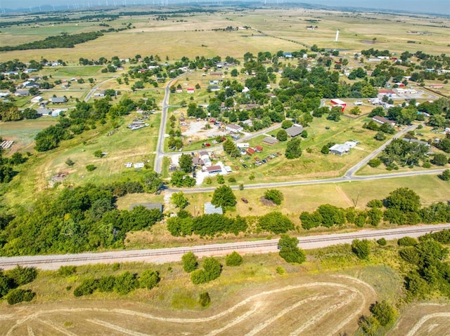 birds eye view of property with a rural view