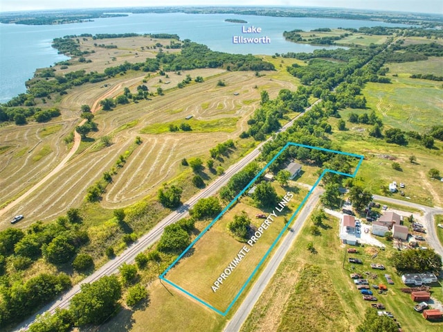 bird's eye view featuring a water view and a rural view