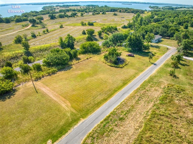 aerial view with a water view and a rural view