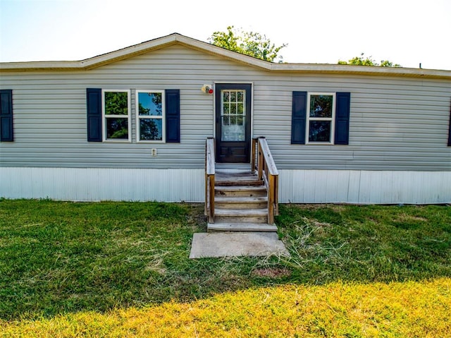 view of front of house with a front lawn