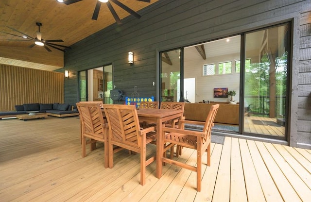 deck featuring ceiling fan, outdoor dining space, and an outdoor living space