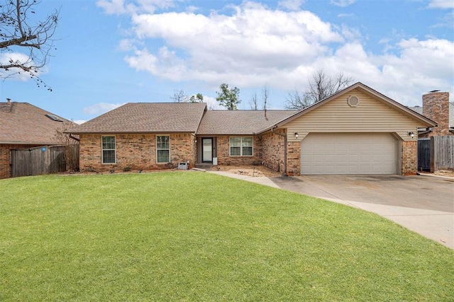 ranch-style home featuring a garage, brick siding, fence, driveway, and a front lawn