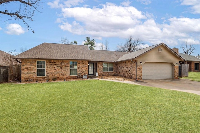 ranch-style house featuring a garage, a front yard, concrete driveway, and brick siding