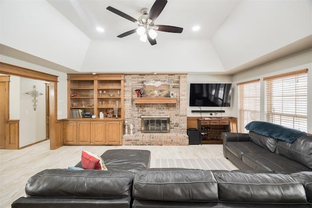 living room with a brick fireplace, ceiling fan, high vaulted ceiling, and recessed lighting