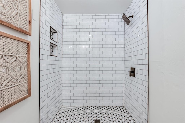 bathroom with a shower stall