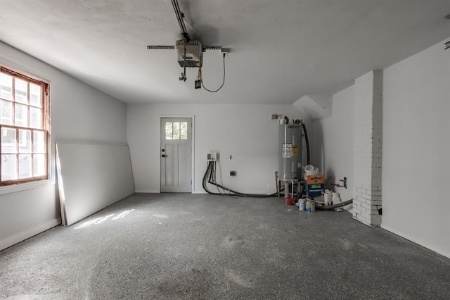 garage with water heater and a garage door opener