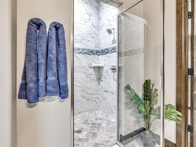 full bathroom featuring a shower stall