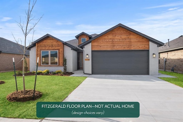 view of front of house with driveway, brick siding, a garage, and a front yard