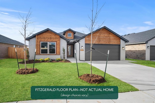 view of front of property featuring an attached garage, brick siding, fence, driveway, and a front yard