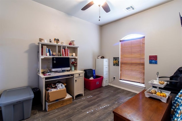 interior space with ceiling fan, dark wood-style flooring, and visible vents