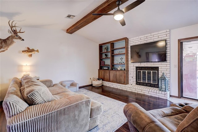 living room with a fireplace, visible vents, lofted ceiling with beams, wood finished floors, and baseboards