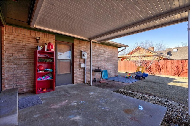 view of patio with fence