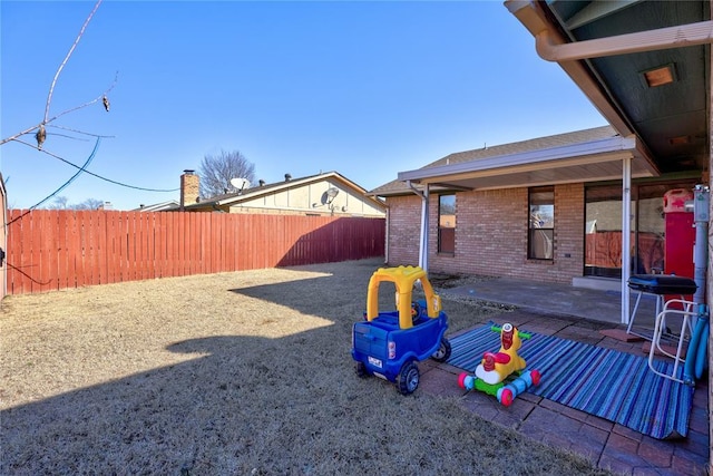 view of yard featuring a fenced backyard and a patio