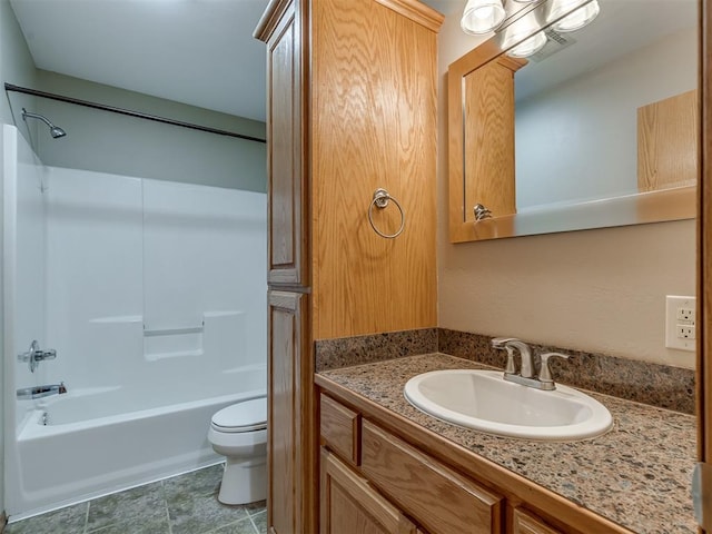 full bathroom featuring visible vents, shower / bathing tub combination, vanity, and toilet