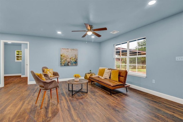 sitting room with recessed lighting, wood finished floors, visible vents, a ceiling fan, and baseboards