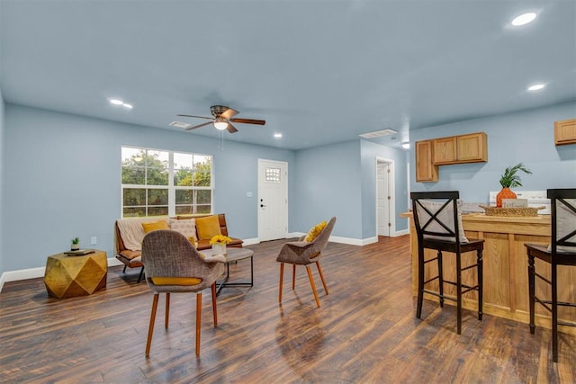 interior space featuring baseboards, dark wood-type flooring, and recessed lighting