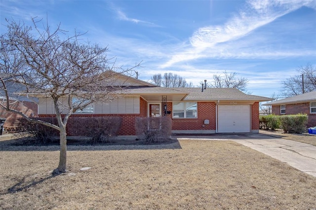 ranch-style house featuring brick siding, roof with shingles, a garage, driveway, and a front lawn