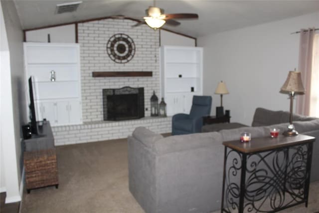 living room with visible vents, lofted ceiling, ceiling fan, carpet floors, and a brick fireplace