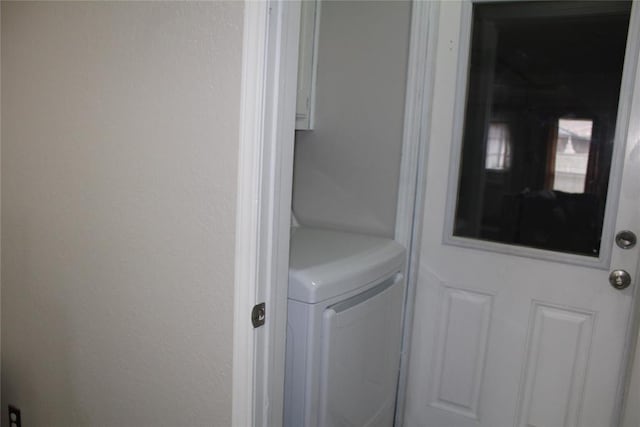 laundry room with laundry area and washer / clothes dryer