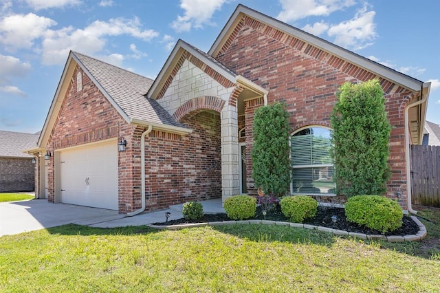 1412 Reid Pryor Rd, Norman, OK 73072 - traditional-style house with an attached garage, brick siding, driveway, and a shingled roof