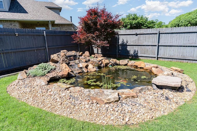 1412 Reid Pryor Rd, Norman, OK 73072 - view of yard with a small pond and fence