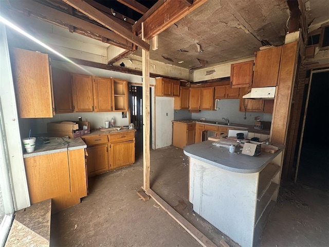 kitchen featuring brown cabinetry and open shelves