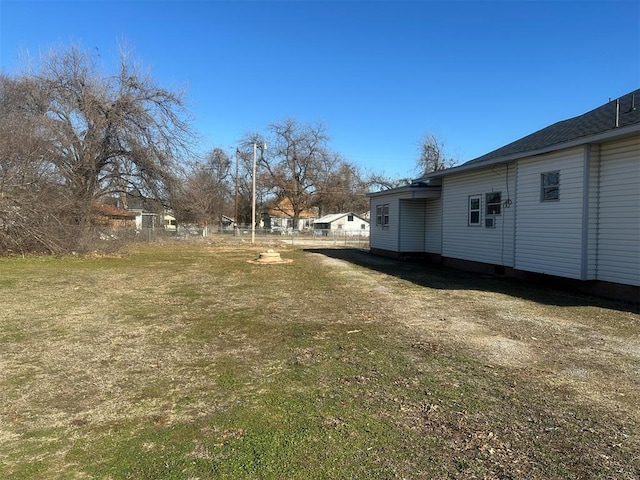 view of yard featuring fence