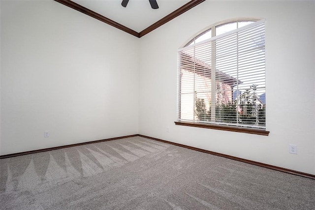 3520 SW 123rd Pl, Oklahoma City, OK 73170 - carpeted spare room featuring a ceiling fan, plenty of natural light, ornamental molding, and baseboards