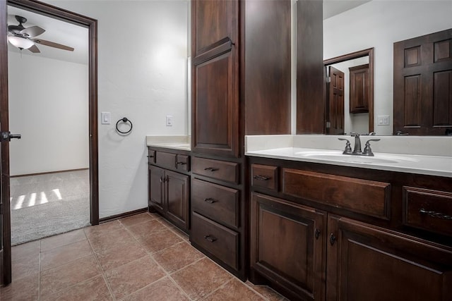 3520 SW 123rd Pl, Oklahoma City, OK 73170 - full bath with ceiling fan, tile patterned floors, vanity, and baseboards
