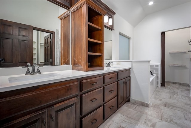 3520 SW 123rd Pl, Oklahoma City, OK 73170 - full bathroom featuring vaulted ceiling, a sink, marble finish floor, and double vanity