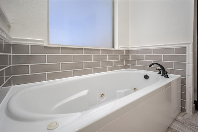 3520 SW 123rd Pl, Oklahoma City, OK 73170 - full bathroom with tile walls and a whirlpool tub